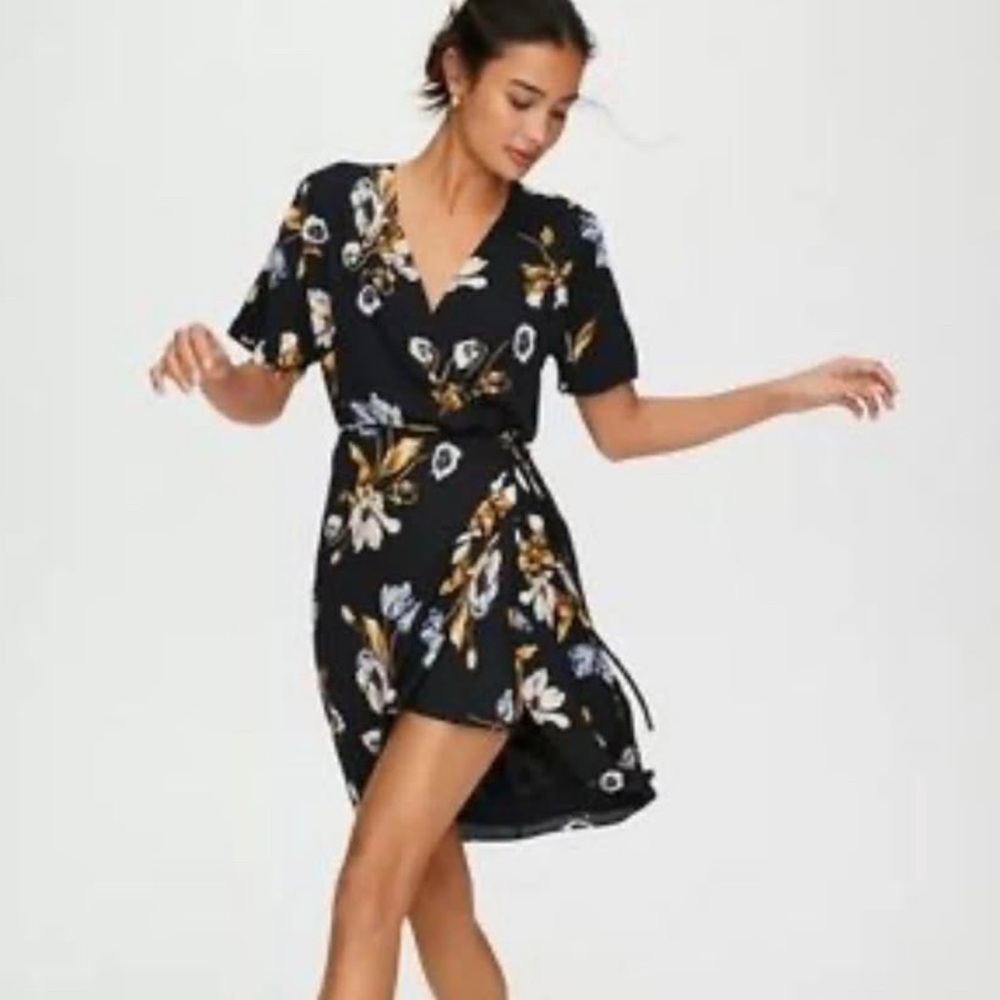 Babaton Black Floral Wrap Dress with White and Gold Accents
